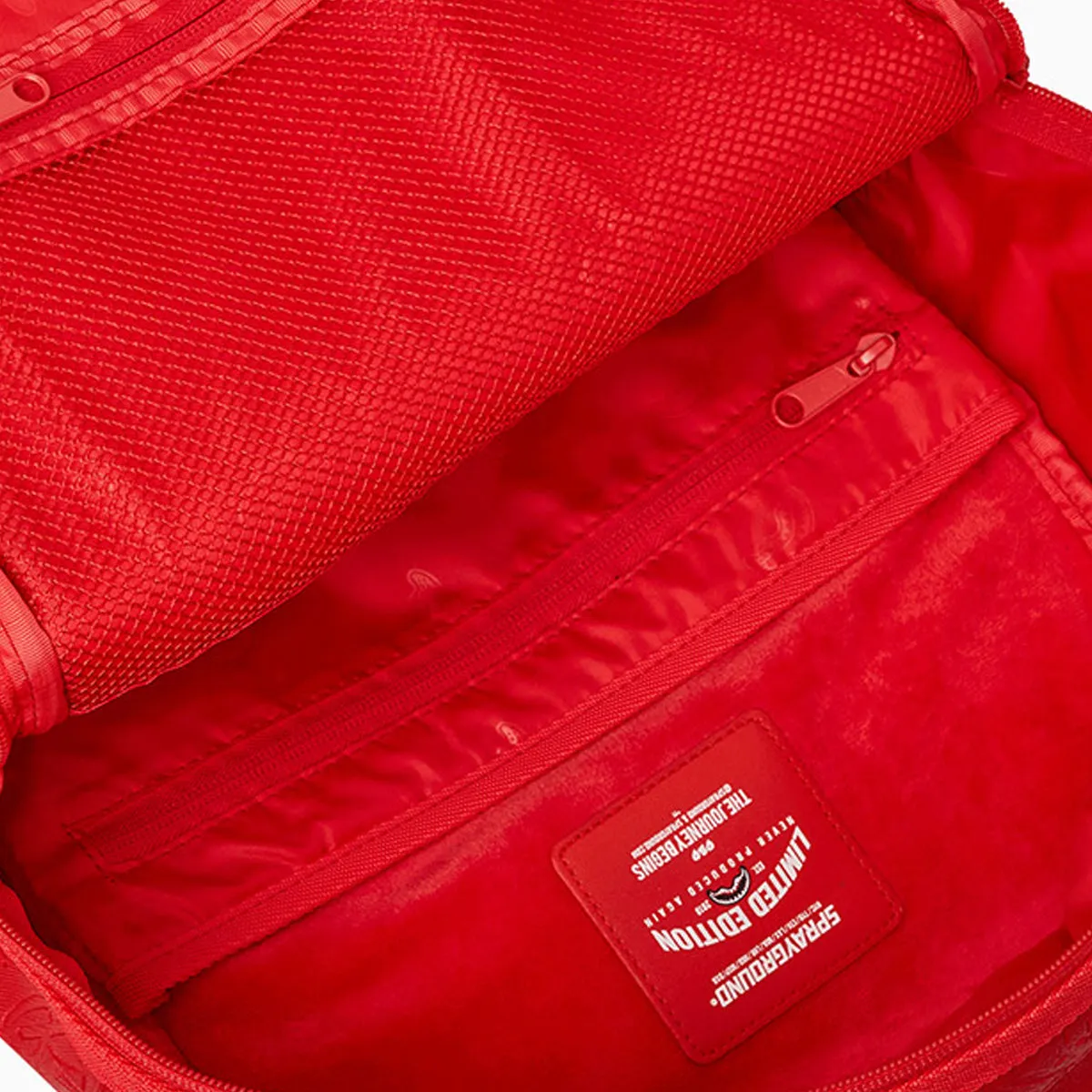 The Red Scribble DLXSV Backpack